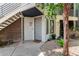 Exterior view featuring neutral siding, staircase access to upper units, and drought resistant landscaping at 3633 N 3Rd Ave # 2031, Phoenix, AZ 85013