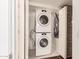 This laundry closet features a stacked washer and dryer at 3633 N 3Rd Ave # 2031, Phoenix, AZ 85013