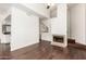 Bright living room with fireplace, flat screen tv, and modern furnishings in neutral color palette at 3633 N 3Rd Ave # 2031, Phoenix, AZ 85013