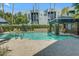 Sparkling pool with waterfall feature, shaded cabana, and lush landscaping in the community at 3633 N 3Rd Ave # 2031, Phoenix, AZ 85013