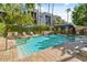 Sparkling pool with waterfall feature, shaded cabana, and lush landscaping in the community at 3633 N 3Rd Ave # 2031, Phoenix, AZ 85013
