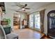 Spacious living room with tile floors and access to an outdoor patio at 3802 W Kelton Ln, Phoenix, AZ 85053