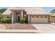 Charming single-story home with well-manicured landscaping and a two-car garage at 4137 E Stanford Ave, Gilbert, AZ 85234
