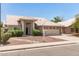Inviting single-story home with a neutral color scheme and desert-friendly landscaping at 4137 E Stanford Ave, Gilbert, AZ 85234