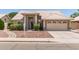 Charming single-story home with well-manicured landscaping and a two-car garage at 4137 E Stanford Ave, Gilbert, AZ 85234