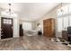 Bright and airy living room featuring hardwood floors, a high ceiling, and ample natural light at 4137 E Stanford Ave, Gilbert, AZ 85234