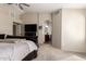 Main bedroom featuring seamless access to a private bathroom, offering convenience and privacy for homeowners at 4137 E Stanford Ave, Gilbert, AZ 85234
