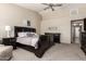 Spacious main bedroom featuring vaulted ceilings, a ceiling fan, and a neutral color palette for a serene atmosphere at 4137 E Stanford Ave, Gilbert, AZ 85234