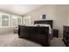 Comfortable main bedroom with large windows, providing ample natural light and a relaxing space at 4137 E Stanford Ave, Gilbert, AZ 85234