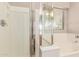 Bathroom featuring a walk-in shower, bathtub, and chrome fixtures at 42551 W Anne Ln, Maricopa, AZ 85138
