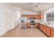 Well-maintained kitchen featuring stainless steel appliances and tiled floor at 42551 W Anne Ln, Maricopa, AZ 85138
