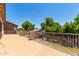 Spacious patio area offering scenic views of the backyard and surrounding landscape at 44517 W Copper Trl, Maricopa, AZ 85139