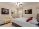 Serene bedroom with neutral tones, stylish decor, and lots of natural light at 5237 N 106Th Ave, Glendale, AZ 85307