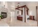 Comfortable bedroom with a four-poster bed and natural light at 5237 N 106Th Ave, Glendale, AZ 85307