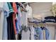 Organized walk-in closet with ample storage space for clothing and accessories at 5237 N 106Th Ave, Glendale, AZ 85307