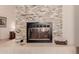 Stone fireplace with mantle and hearth at 5237 N 106Th Ave, Glendale, AZ 85307