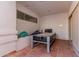 Enclosed game room with tile floors, recessed lighting and a modern air hockey table at 5237 N 106Th Ave, Glendale, AZ 85307
