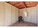 Small indoor area with ceiling and wall support, hanging hammock and chair in the corner at 5237 N 106Th Ave, Glendale, AZ 85307