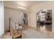 Open living space with tile floors and view into the Gathering room at 5237 N 106Th Ave, Glendale, AZ 85307