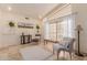 Bright and airy living room with neutral decor and large windows at 5237 N 106Th Ave, Glendale, AZ 85307