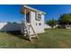 Charming backyard playhouse with ladder and window, perfect for playtime and outdoor fun at 5237 N 106Th Ave, Glendale, AZ 85307