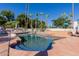 Backyard pool area with palm trees, a diving board, and plenty of space for lounging and relaxation at 5237 N 106Th Ave, Glendale, AZ 85307