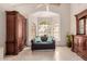 Cozy sitting room featuring a decorative window, comfortable seating, and elegant furnishings at 5237 N 106Th Ave, Glendale, AZ 85307