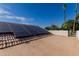 Image shows solar panels installed on a tile roof under a blue sky, offering an energy-efficient home solution at 5237 N 106Th Ave, Glendale, AZ 85307