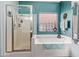 Bathroom includes a tub, shower and tiled window at 5314 W Bowker St, Laveen, AZ 85339