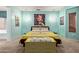 Stylish bedroom highlighting contemporary lighting and colorful artwork at 5314 W Bowker St, Laveen, AZ 85339