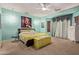Bright bedroom with unique lighting, stylish decor, and comfortable furnishings at 5314 W Bowker St, Laveen, AZ 85339