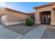 View of the entryway and a well maintained desert front yard at 5314 W Bowker St, Laveen, AZ 85339