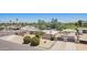 An aerial view of property with desert landscaping, a pool, RV parking, and privacy walls at 6329 E Voltaire Ave, Scottsdale, AZ 85254
