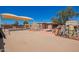 Spacious backyard with a fire pit, pool, and outdoor seating, ideal for entertaining and relaxation at 6329 E Voltaire Ave, Scottsdale, AZ 85254
