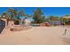 Backyard with pool, fire pit, and outdoor seating, great for entertaining and enjoying the outdoors at 6329 E Voltaire Ave, Scottsdale, AZ 85254