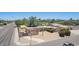 Charming single-story home with mature trees, a spacious yard, and ample parking space at 6329 E Voltaire Ave, Scottsdale, AZ 85254