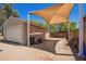 Detached garage with carport covering, perfect for storing vehicles and recreational equipment at 6329 E Voltaire Ave, Scottsdale, AZ 85254