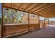 Covered patio with view of backyard shed and pool area at 6329 E Voltaire Ave, Scottsdale, AZ 85254