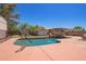 Refreshing pool with a unique rock waterfall feature, offering a tranquil oasis at 6329 E Voltaire Ave, Scottsdale, AZ 85254