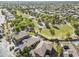 Expansive neighborhood park featuring green space, a basketball court, trees, and a walking path at 6922 S Black Hills Way, Chandler, AZ 85249