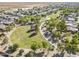 Overhead view of a community park with walking paths, green space, and mature trees at 6922 S Black Hills Way, Chandler, AZ 85249