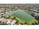 Community featuring a lake surrounded by homes, parks, and a walking path at 6922 S Black Hills Way, Chandler, AZ 85249