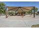 A colorful playground with various slides, climbing structures, and shaded areas for to enjoy at 6922 S Black Hills Way, Chandler, AZ 85249