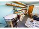 The dedicated craft room offers ample storage, counter space, and equipment for various art projects at 701 S Dobson Rd # 447, Mesa, AZ 85202