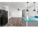 Bright, open kitchen featuring an island and breakfast bar, modern appliances, and tile backsplash at 701 S Dobson Rd # 447, Mesa, AZ 85202
