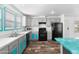 Well-appointed kitchen with stainless steel appliances, light-colored cabinetry, and durable flooring at 701 S Dobson Rd # 447, Mesa, AZ 85202