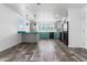 Open concept kitchen with stainless steel appliances, modern finishes, and stylish flooring at 701 S Dobson Rd # 447, Mesa, AZ 85202