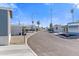 View of a quiet street lined with well-maintained homes at 701 S Dobson Rd # 447, Mesa, AZ 85202