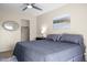 Serene bedroom featuring a bed, closet, and art on the wall at 735 E Cochise Dr, Phoenix, AZ 85020
