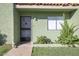 Inviting front entrance with a charming door and beautiful desert landscaping at 735 E Cochise Dr, Phoenix, AZ 85020